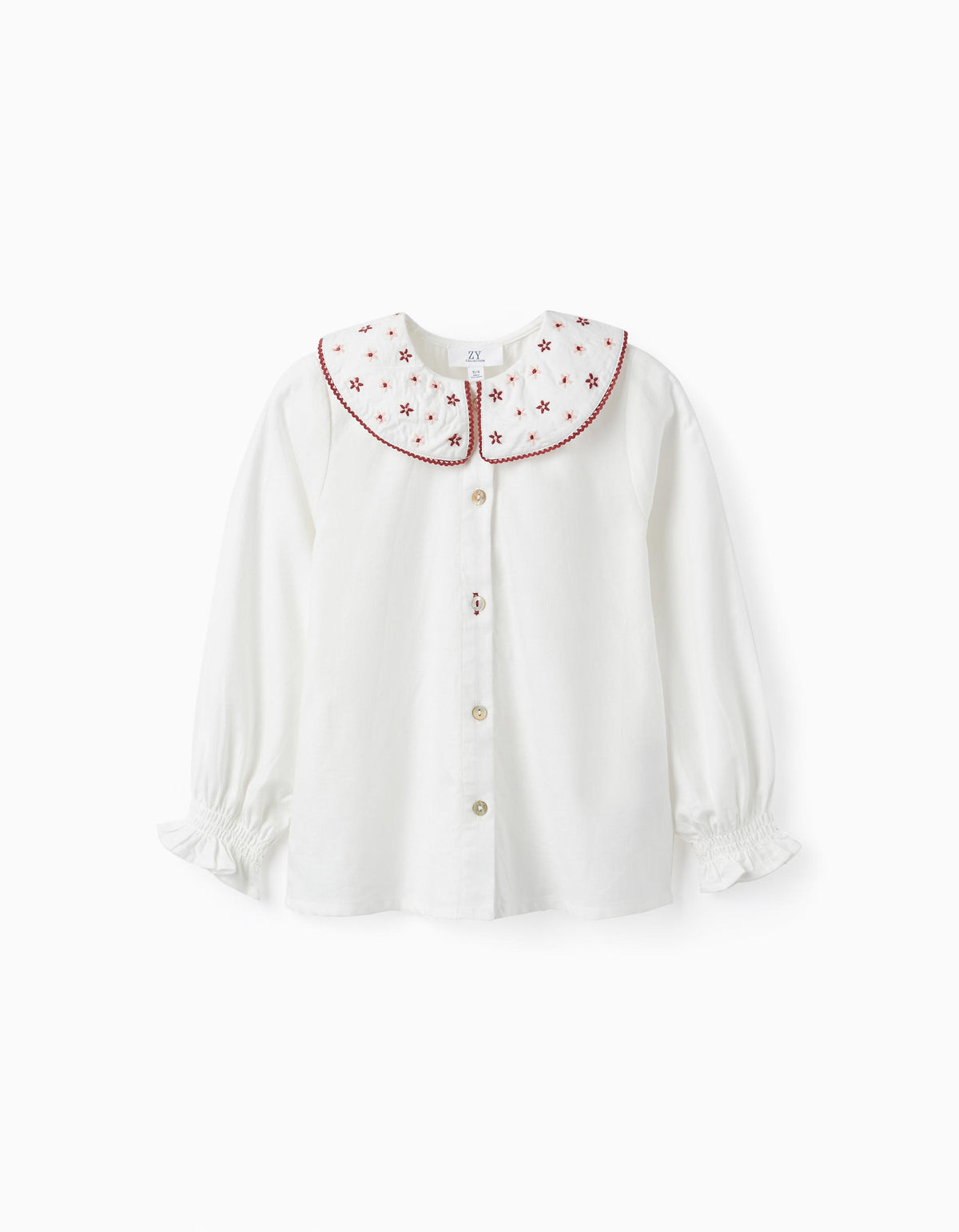 Blusa en algodón cuello grande y bordado